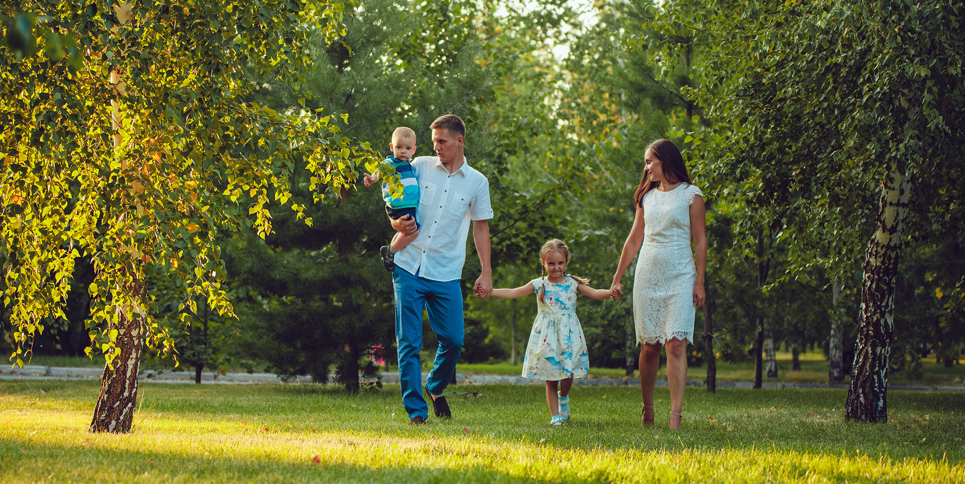 A young family walking together